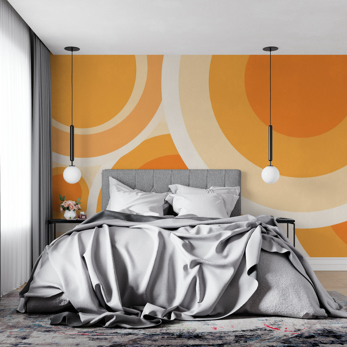 Geometric pattern wallpaper adding warmth to a bedroom setting