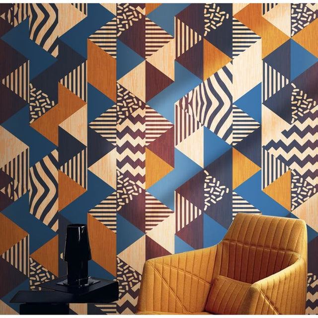 Geometric pattern wallpaper bringing retro charm to a modern living room with blue and orange accents
