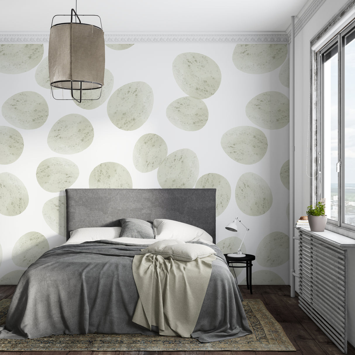 Green geometric wallpaper enhancing a clean Scandinavian bedroom