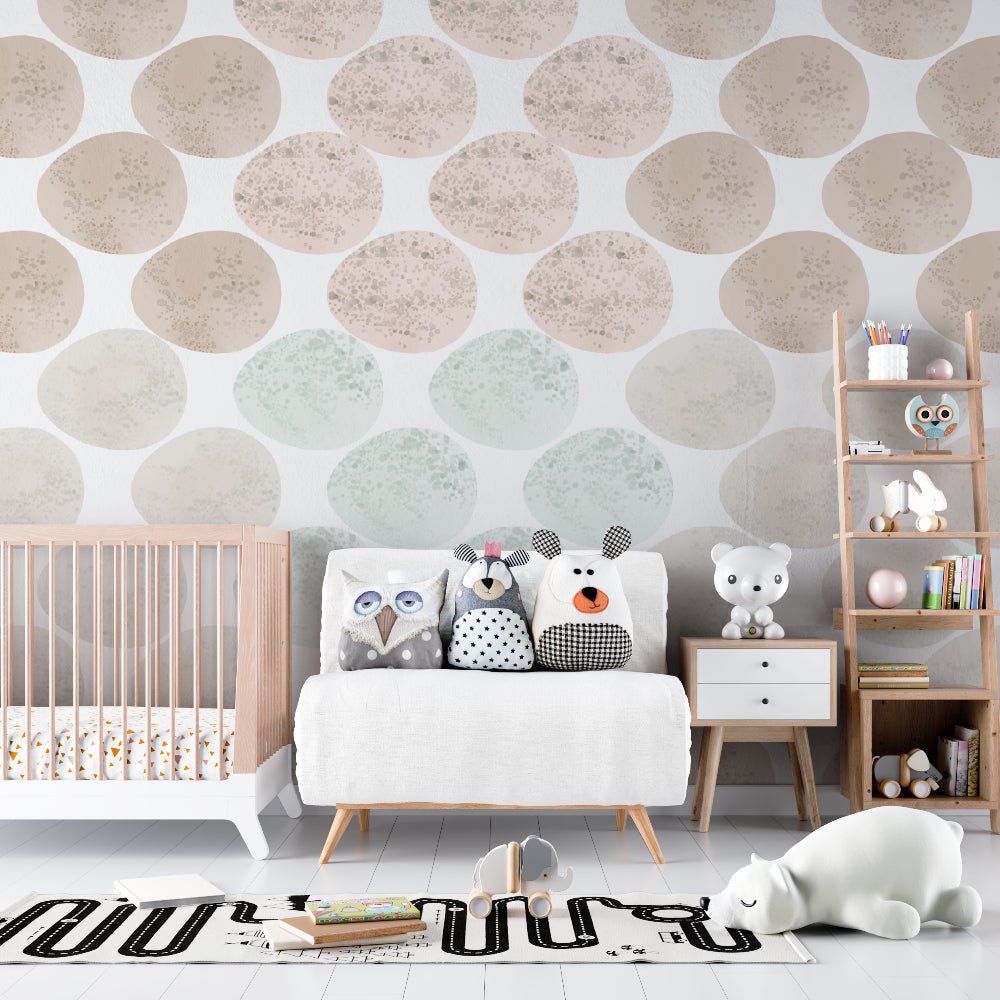 Nursery with gentle geometric circle wallpaper, pastel colors creating peaceful atmosphere
