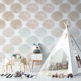 Home office featuring modern geometric circle wallpaper in soft pastel tones