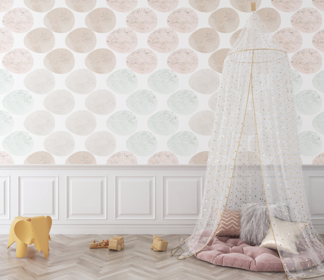 Bedroom with geometric pastel circle wallpaper showing pattern scale and room brightening effect