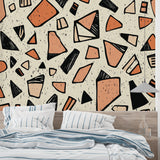 Modern geometric pattern mural in dining room with natural lighting