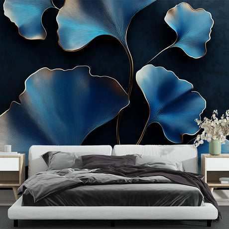 Blue and gold Ginkgo art deco wallpaper in a modern dining room with pendant lighting and dark furniture