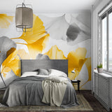 Botanical wall mural with yellow Ginkgo leaves in bedroom setting
