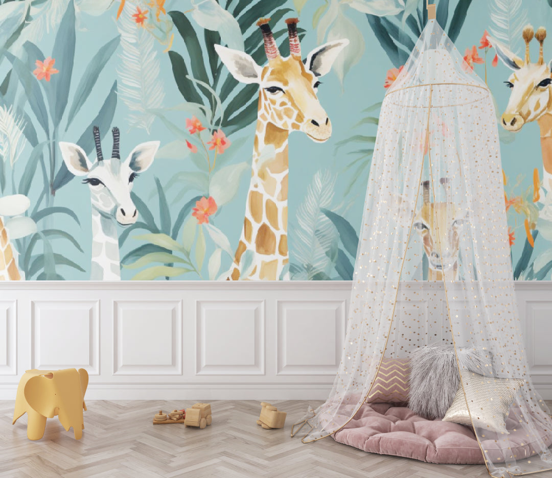 Giraffe wallpaper mural in a bright nursery with coral accents and natural light