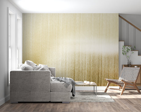 Gold brushed metal wallpaper in modern living room creates elegant atmosphere with natural light