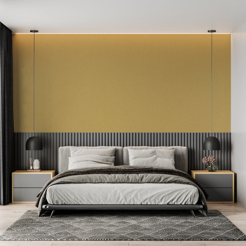 Plain gold wallpaper creating a warm ambiance in a master bedroom