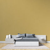 Gold wallpaper adding luxury to a hotel-style entrance hallway