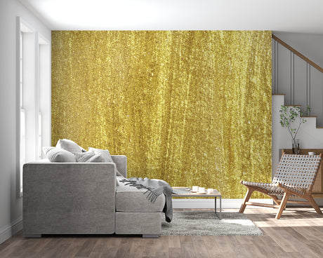 Gold metallic textured wallpaper creating a luxurious atmosphere in a modern living room