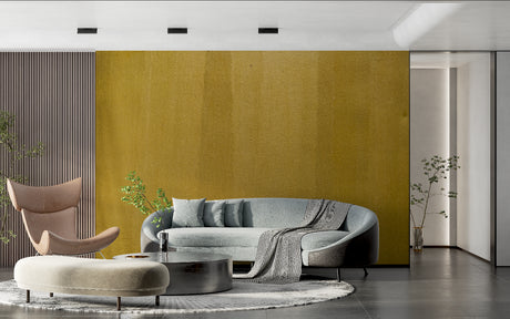 Gold textured wallpaper in modern living room creating warm, sophisticated atmosphere