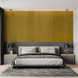 Luxury gold wallpaper featured in master bedroom with evening lighting