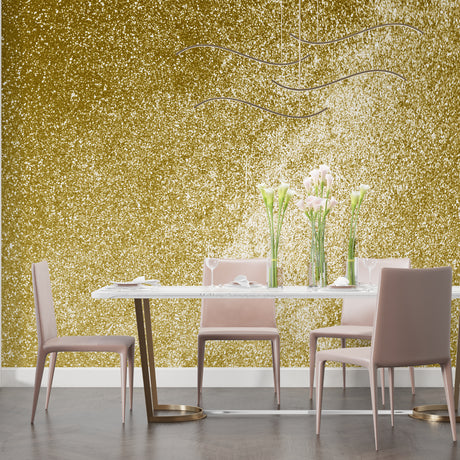 Gold sparkle wallpaper creating a luxurious atmosphere in a modern living room with natural light
