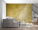 Metallic gold wallpaper making a statement in a master bedroom with evening lighting