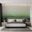 Green gradient wallpaper creating a serene atmosphere in a modern living room with minimal furniture