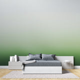 Minimalist gradient mural creating flow in an entrance hallway