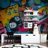 Music-themed graffiti wallpaper transforming a creative studio space with vibrant urban design