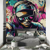 Street art mural in a music studio showing vibrant graffiti design with headphones motif