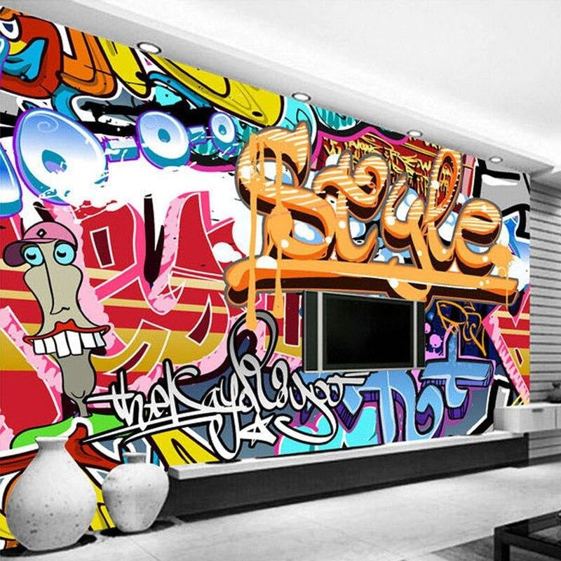 Teen bedroom featuring vibrant street art wallpaper with dynamic graffiti elements