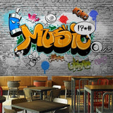 Urban street art wallpaper making statement in creative office space with industrial furniture