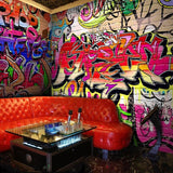Teen bedroom featuring Street Art Wallpaper adding cool urban style and creative energy to the space