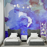 Urban street art wallpaper creating bold statement in creative studio space