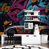 Urban street art wallpaper with sports car displayed in entertainment room