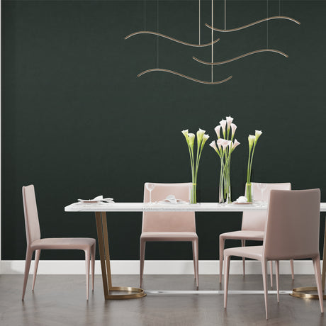 Deep forest green wallpaper creating a cozy atmosphere in modern living room with natural light
