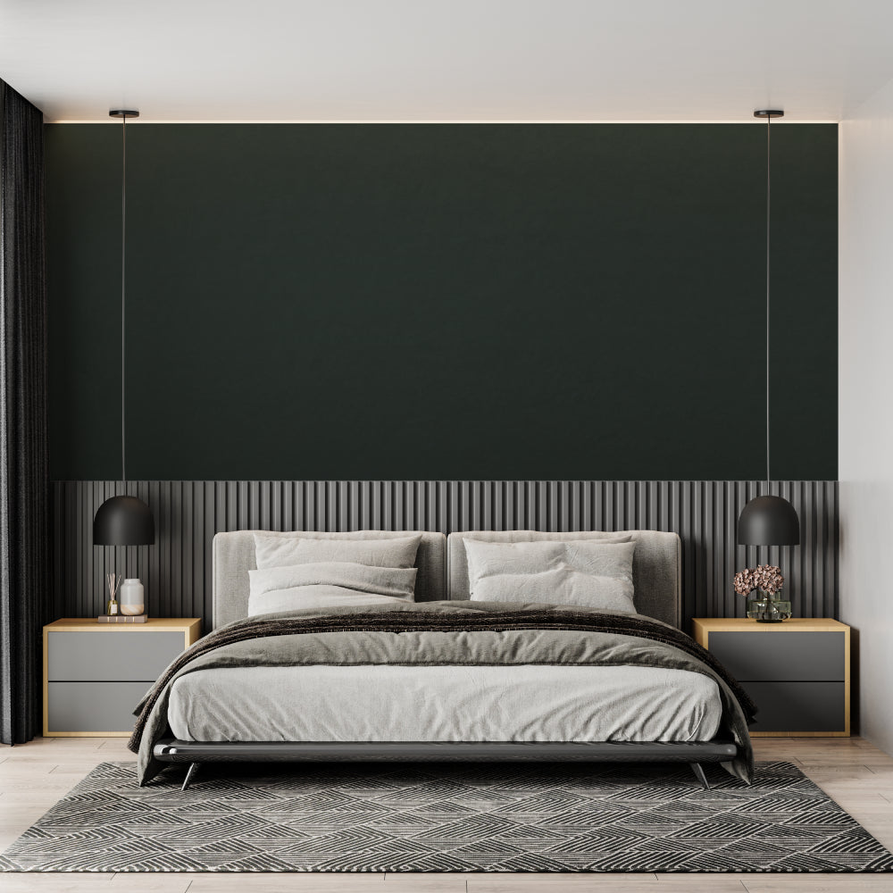 Reading nook with emerald green wallpaper creating a peaceful corner