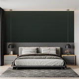 Reading nook with emerald green wallpaper creating a peaceful corner