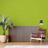 Fresh green wallpaper making a bold statement in bedroom interior