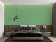 Modern green mural wallpaper in minimalist living room with natural light streaming through large windows