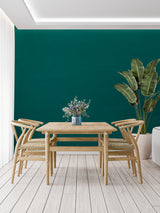 Green wall mural creating calm atmosphere in modern bedroom