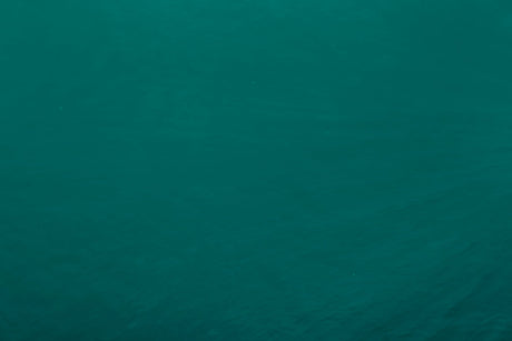 Design file of emerald green wallpaper showing rich color detail and pattern