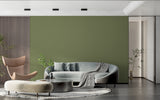 Khaki green wallpaper in minimalist bedroom creating calm atmosphere