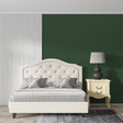 Modern green wallpaper in a bright living room setting with minimal furniture and large windows