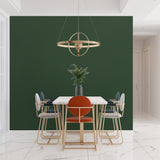Emerald green mural in a modern kitchen with white cabinets and marble countertops