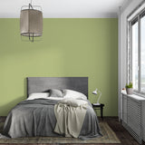 Green bamboo wall mural creating harmony in a meditation room