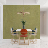 Olive green textured wallpaper in modern living room creating a serene atmosphere