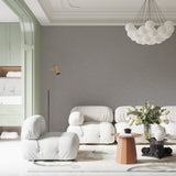 Grey minimalist wall mural in modern bedroom creating calm atmosphere