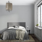 Modern grey wall design adding sophistication to a master bedroom