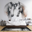 Black and white horse mural wallpaper creating drama in modern living room with grey furniture and natural light
