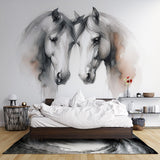 Black and white horse mural wallpaper creating drama in modern living room with grey furniture and natural light