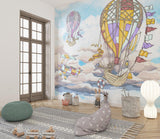 Adventure sky mural with vintage aircraft displayed in a modern playroom setting