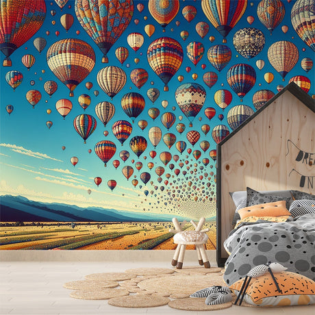 Hot air balloon wallpaper bringing adventure to a bright kids bedroom, floating balloons creating depth and wonder