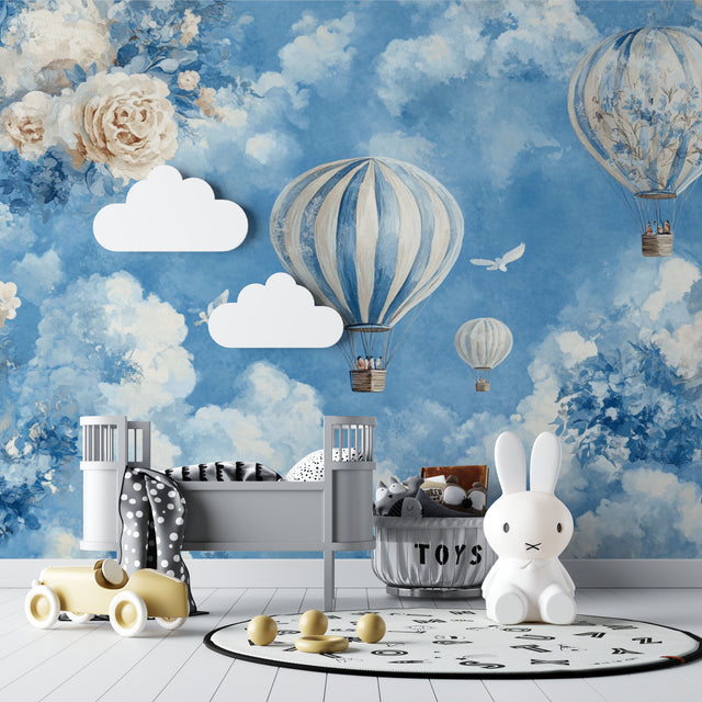 Hot air balloon nursery wallpaper creating a magical atmosphere in a bright, modern nursery with white furniture