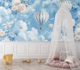 Dreamy hot air balloon mural displayed in a peaceful kids bedroom with natural light