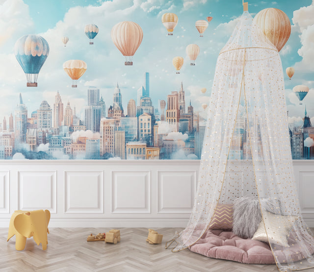 Hot air balloon wallpaper in a bright nursery, showing pastel balloons floating above city skyline