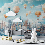 Playroom wall with dreamy balloon cityscape mural creating depth and wonder