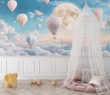 Moonlit balloon wallpaper adding whimsy to a modern playroom setting